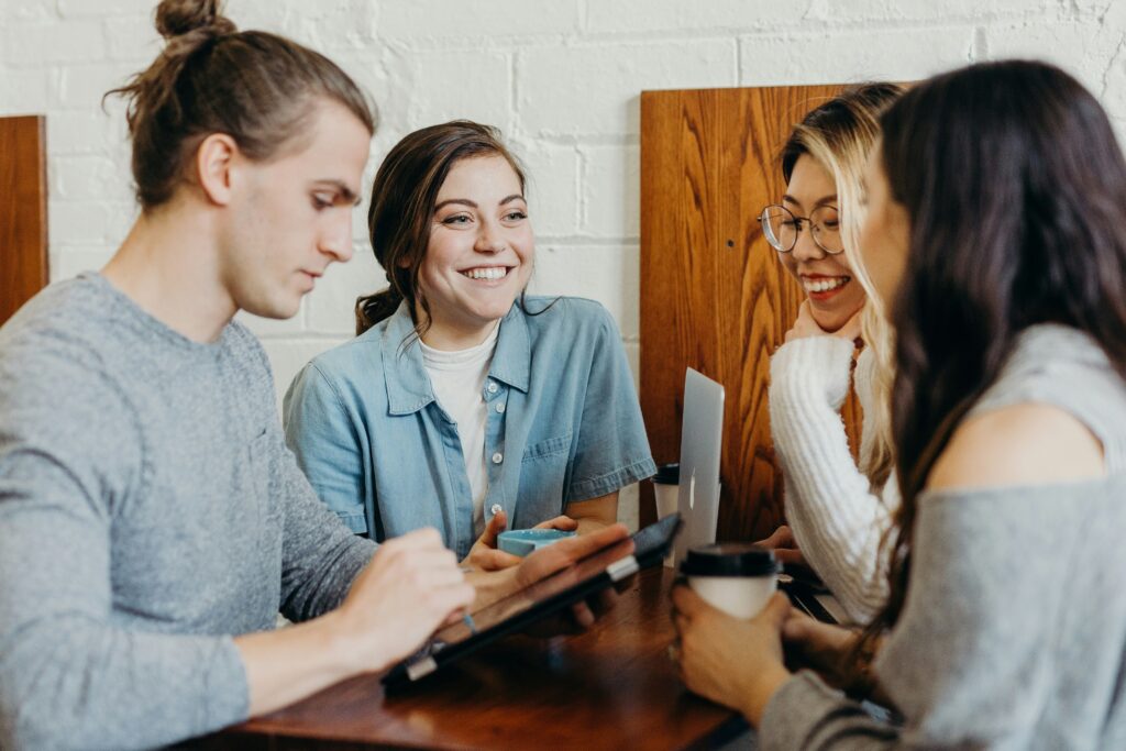 group of marketing interns having a meeting