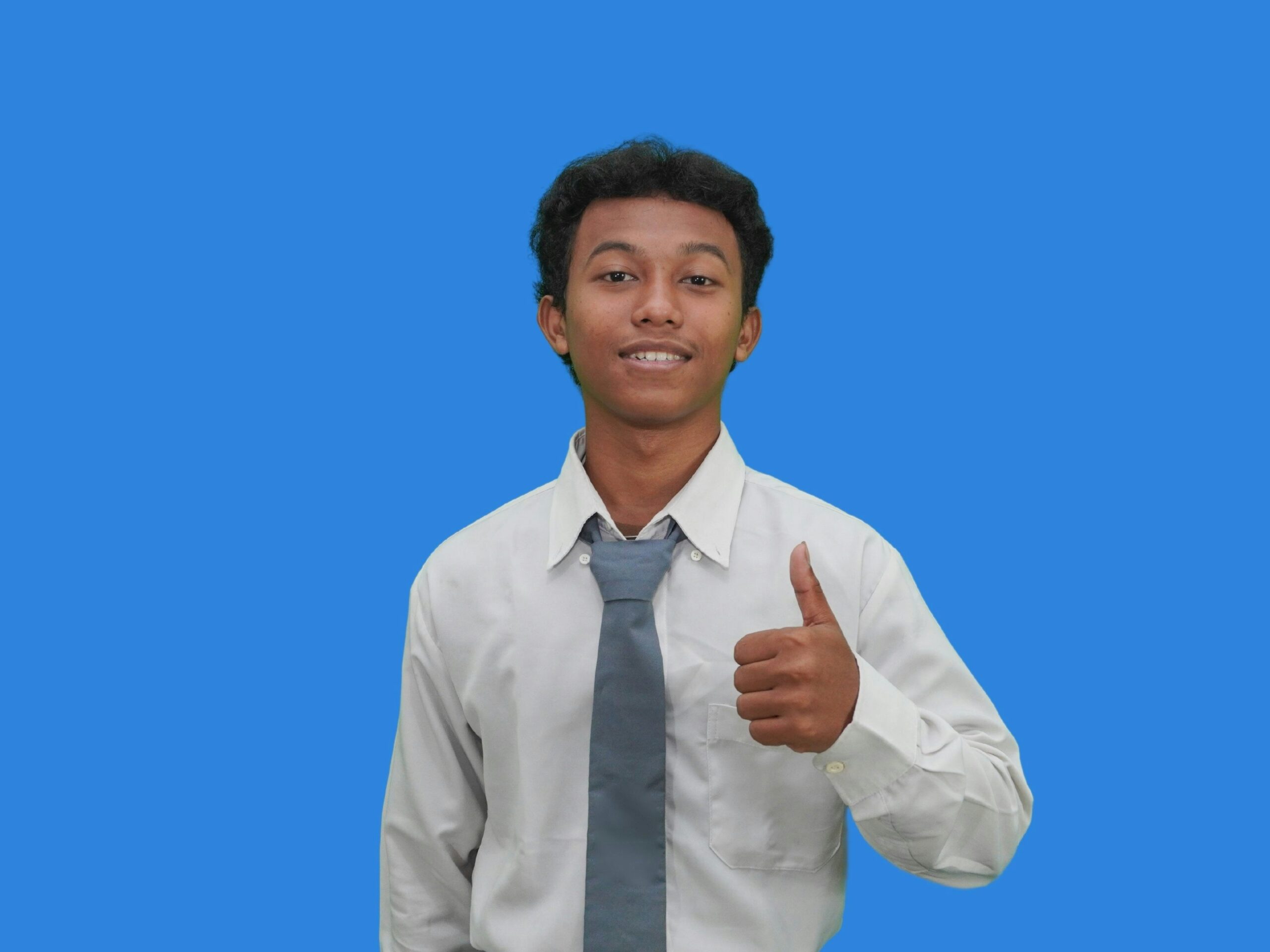 A young professional enjoying their sales and marketing role for students