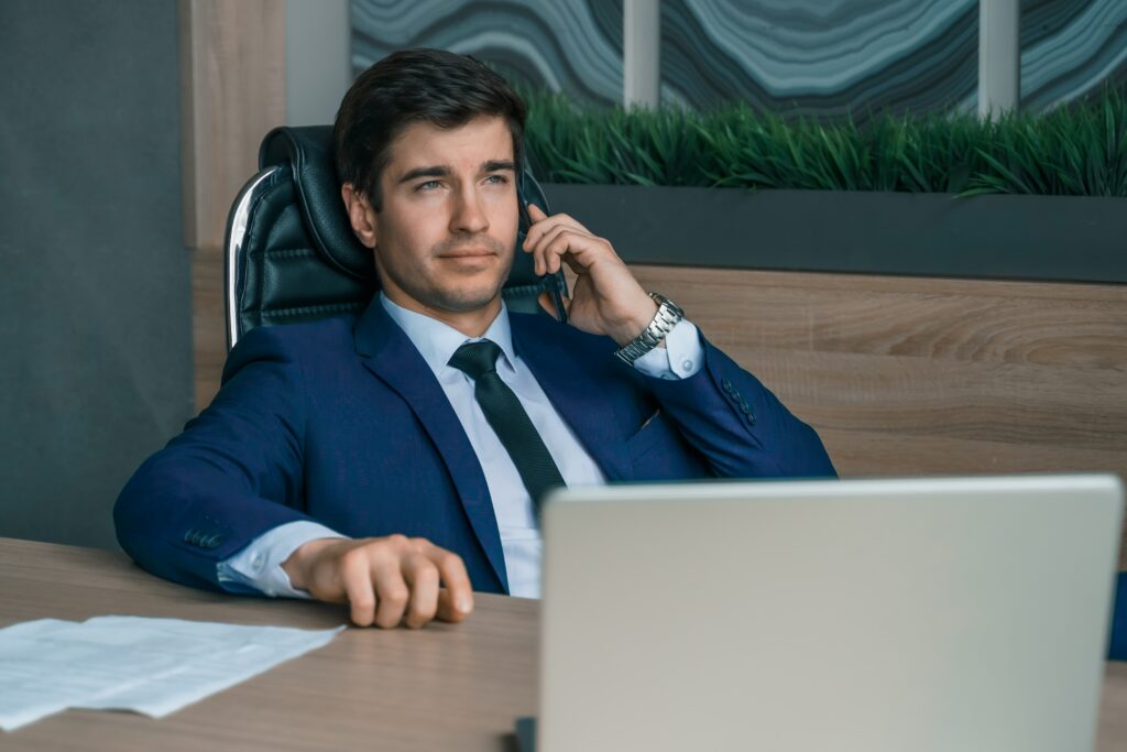A business development professional on the phone